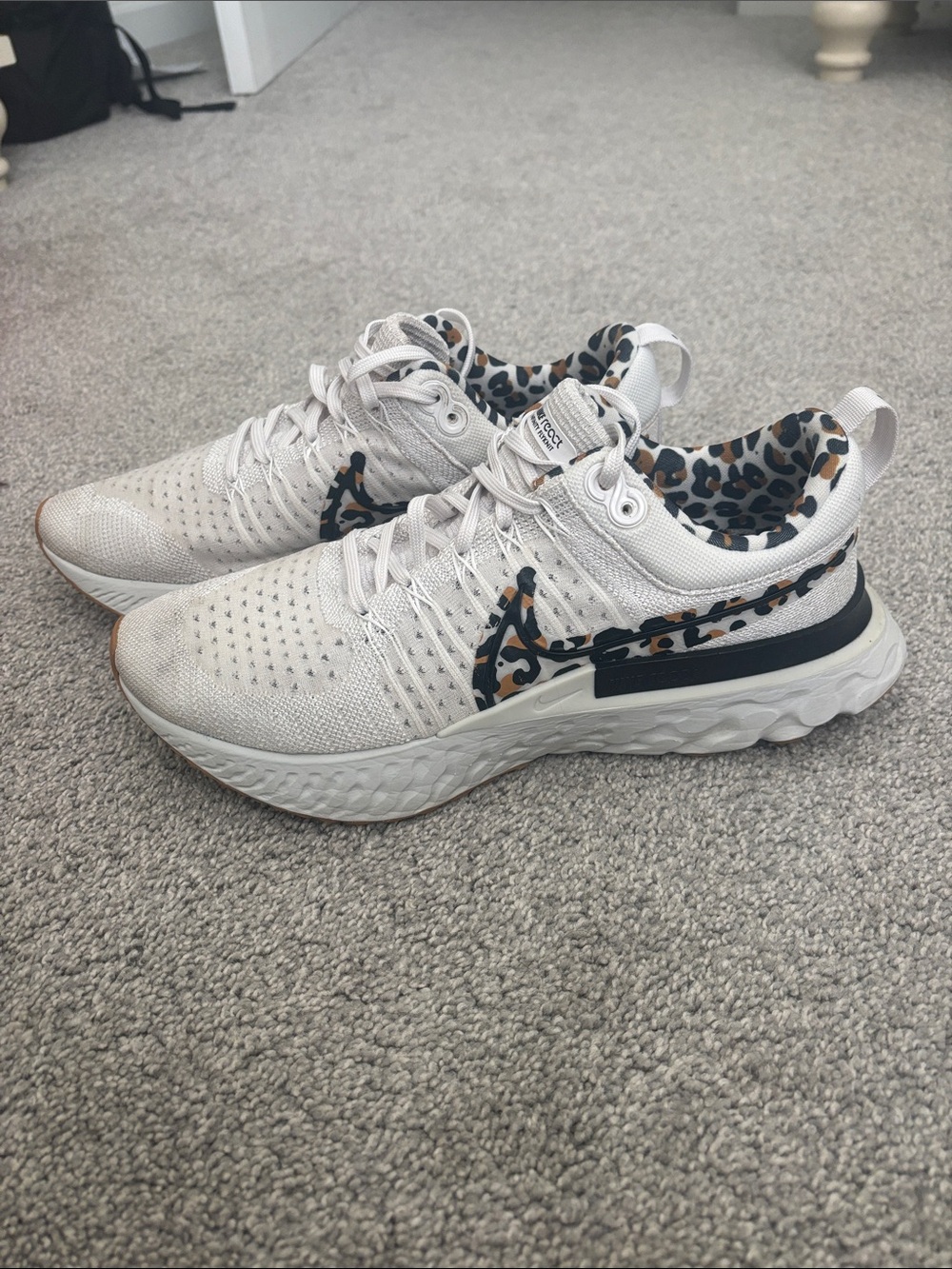 Nike White Athletic Sneakers with Leopard Print Trim